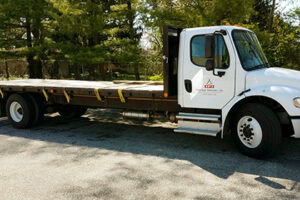 New Freightliner Business Class M2 106 24ft Flatbed Truck Added To Our Fleet